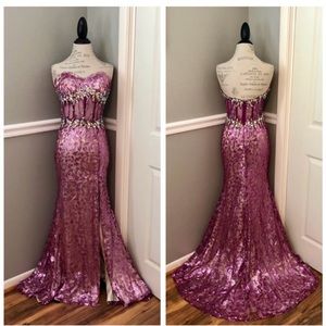 NEW PARTY TIME FORMALS SZ 6 MAGENTA
NWT NUDE BEADED CORSET ILLUSION EVENING
GOWN